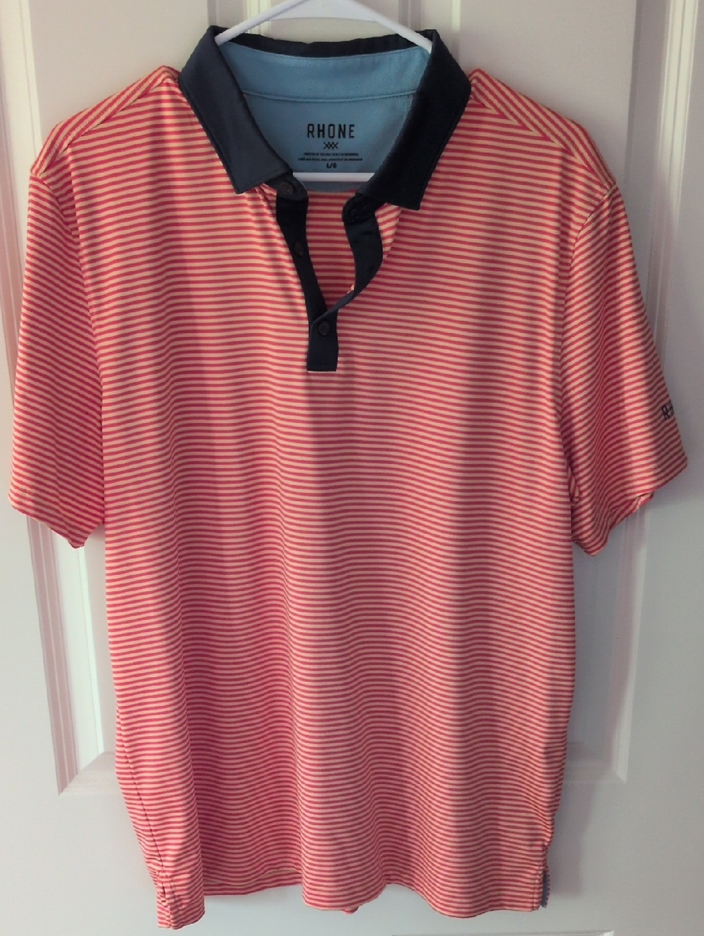 RHONE Coral and White Thin-Striped Polo with Black Collar